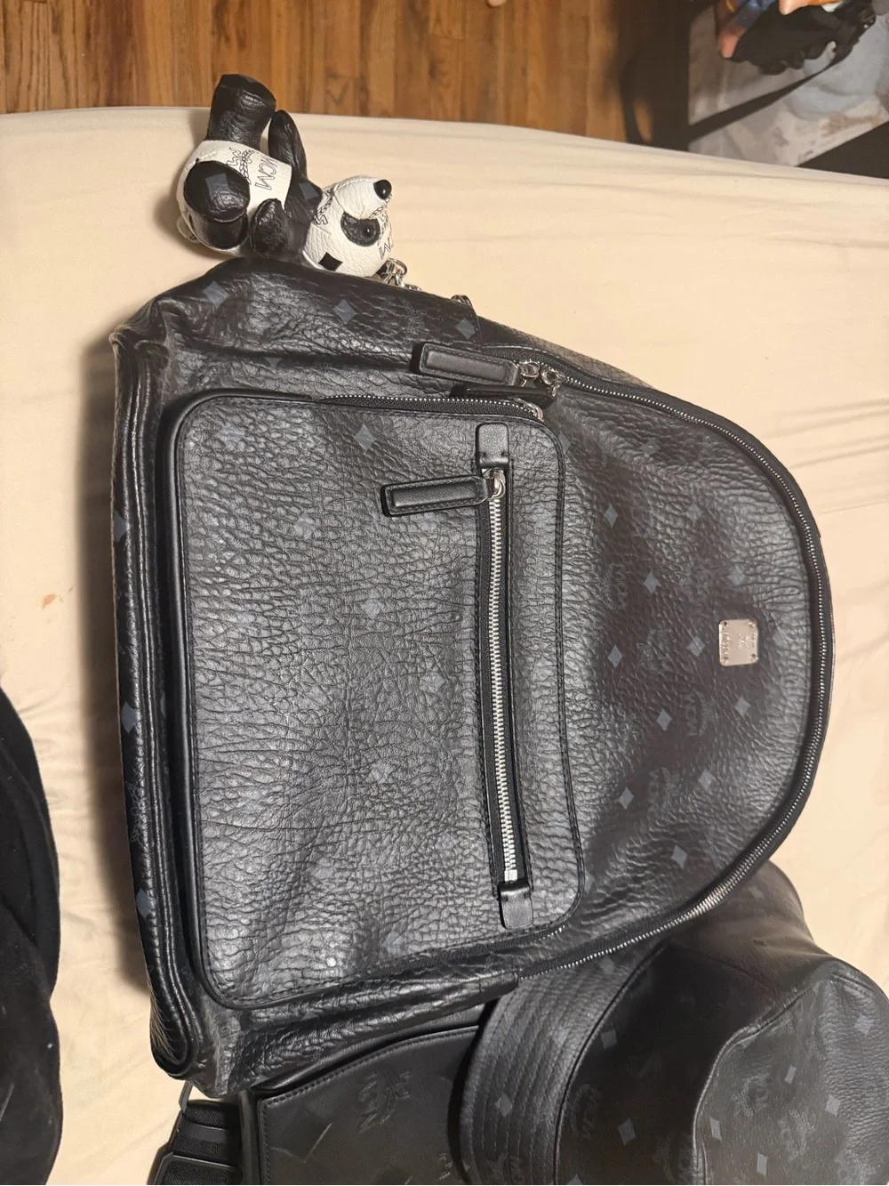 MCM Black Monogram Leather Backpack with Silver Zip Accents